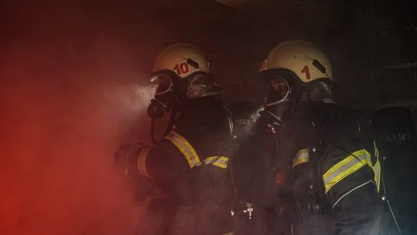 man in black helmet and helmet